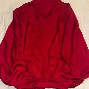 Pants Store Red Satin top. Open slit on shoulders and cuffed bottom and wrist.